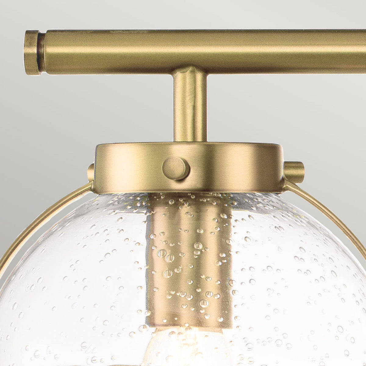 Hollis IP44 Triple Wall Light in Heritage Brass with Clear Seeded Glass