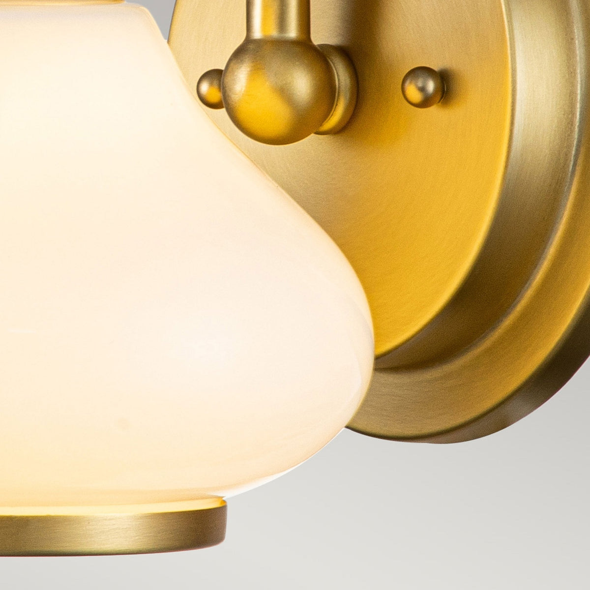 Ainsley IP44 Single Wall Light in Brushed Brass with Opal Glass