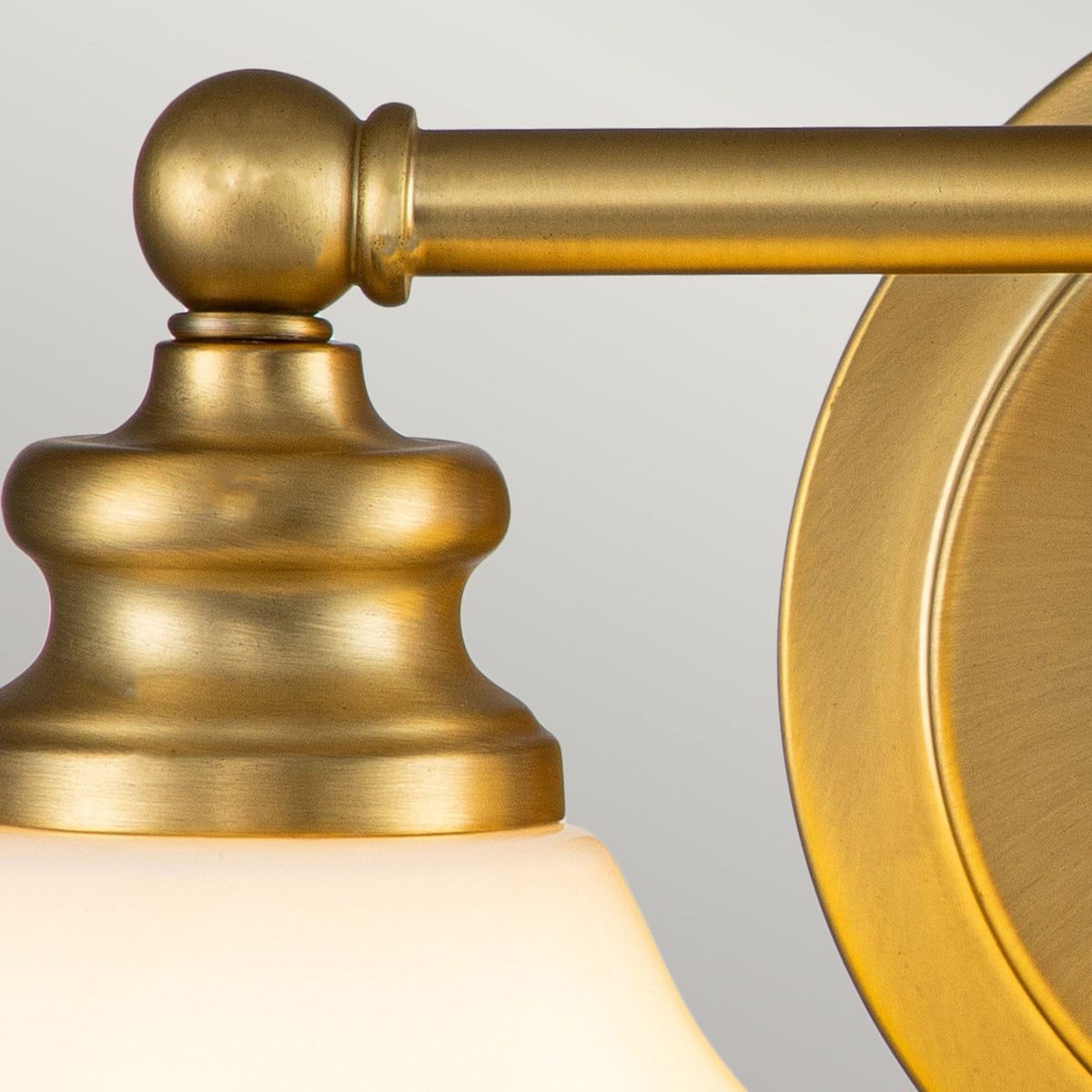 Ainsley IP44 Twin Wall Light in Brushed Brass with Opal Glass