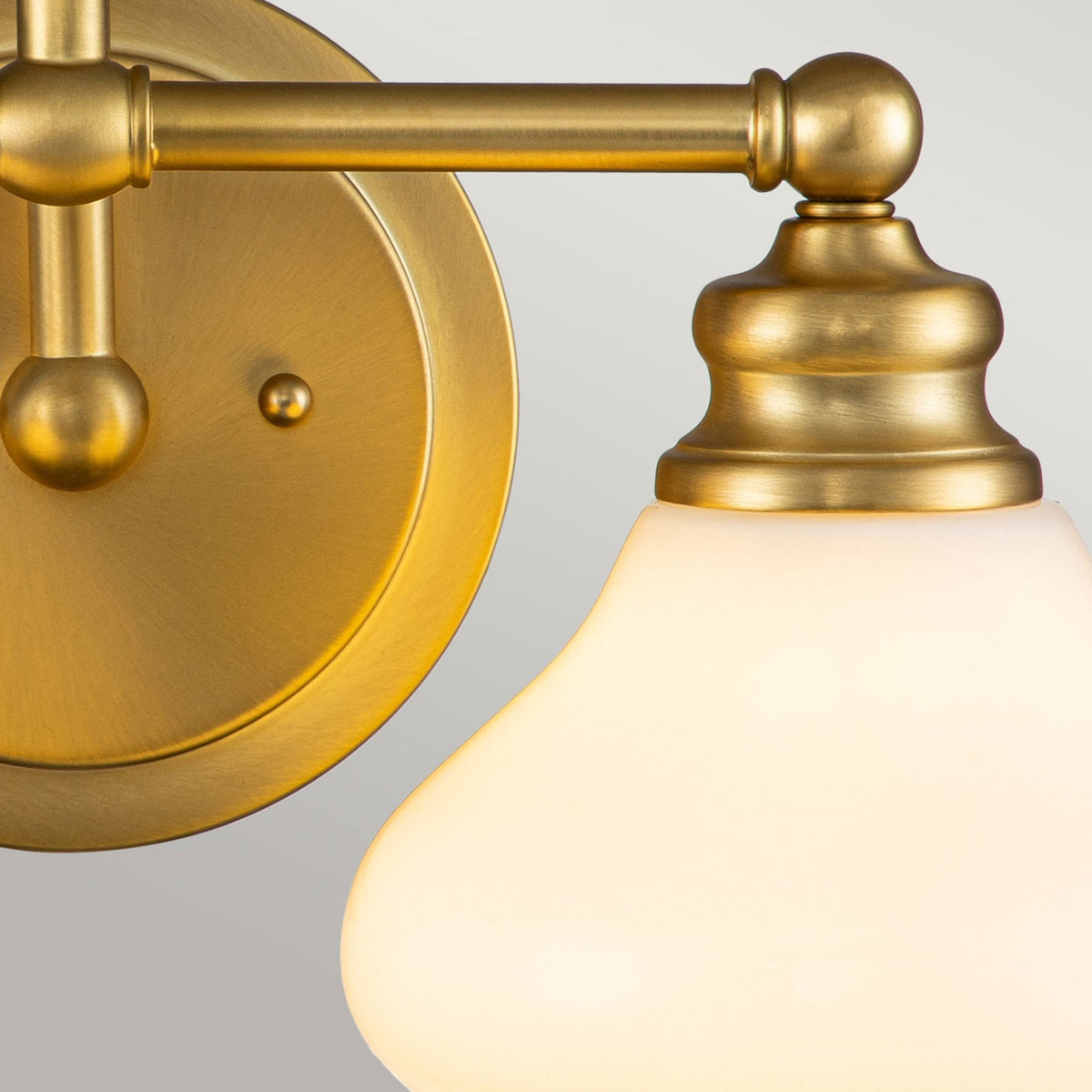 Ainsley IP44 Twin Wall Light in Brushed Brass with Opal Glass