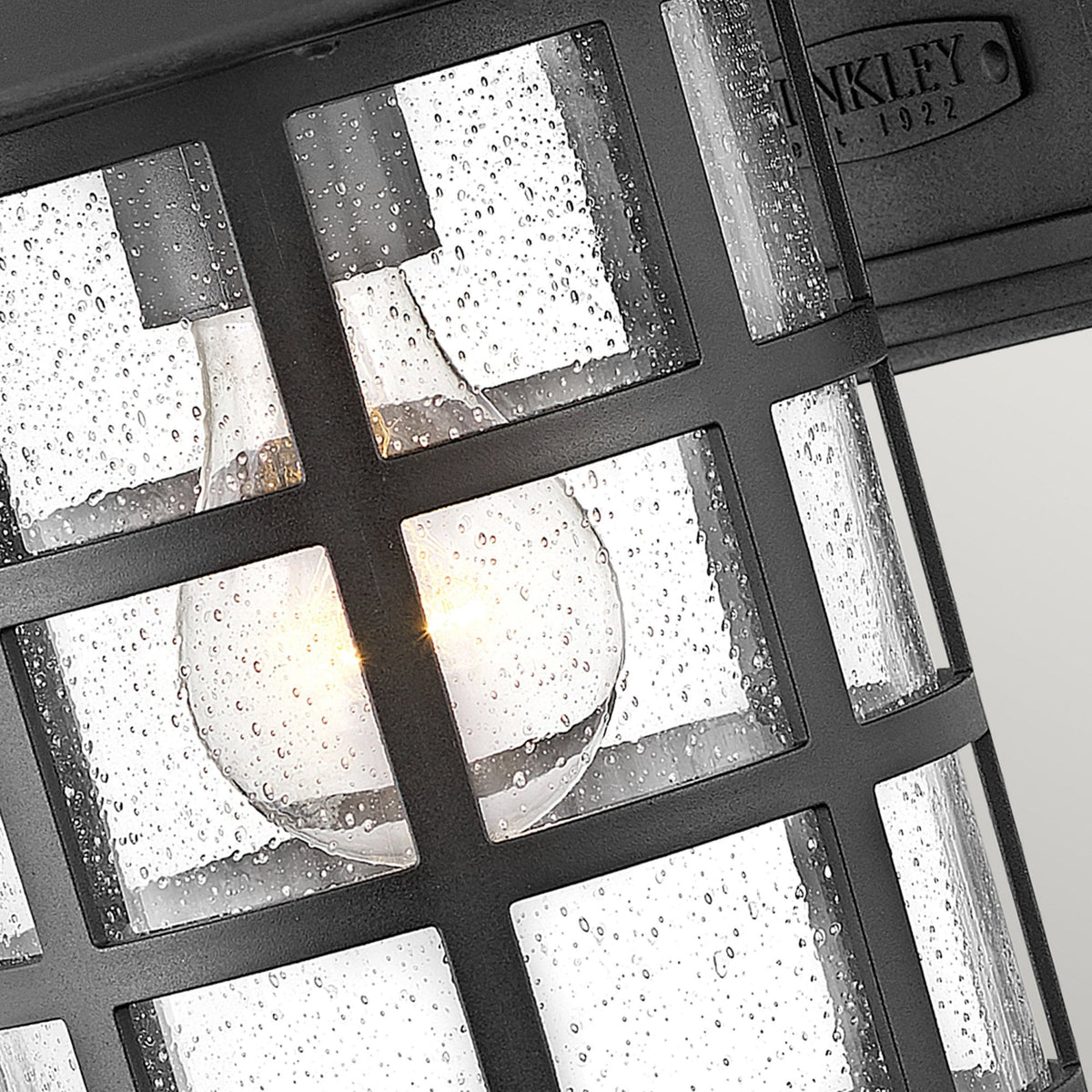 Freeport Medium Coastal Wall Light in Textured Black with Clear Seeded Glass