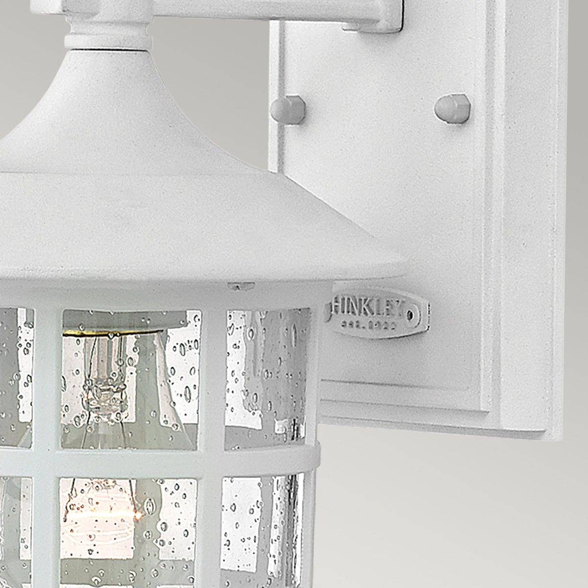 Freeport Small Coastal Wall Light in Textured White with Clear Seeded Glass