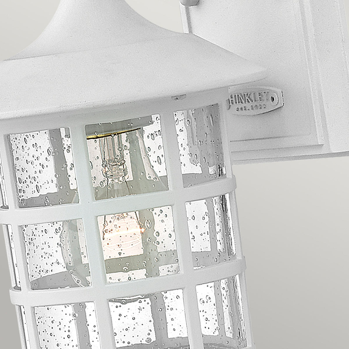 Freeport Small Coastal Wall Light in Textured White with Clear Seeded Glass