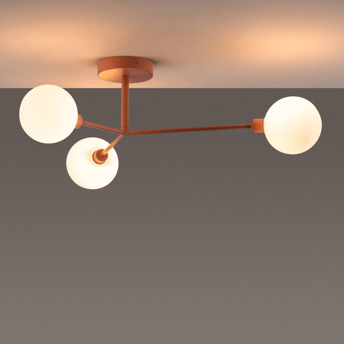 Houseof Alyssa IP44 Three Lamp G9 Semi Flush in Pink, a ceiling light with three spherical bulbs