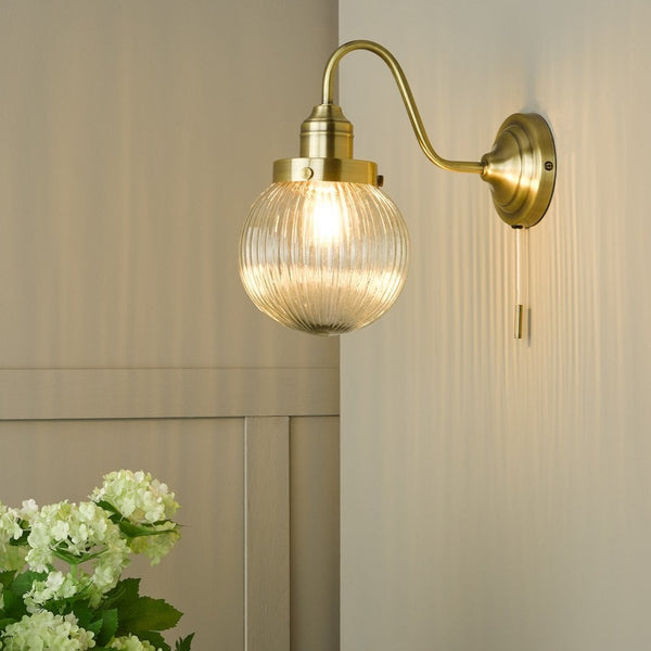 Tamara Switched Wall Light In Antique Brass With Ribbed Glass Shade