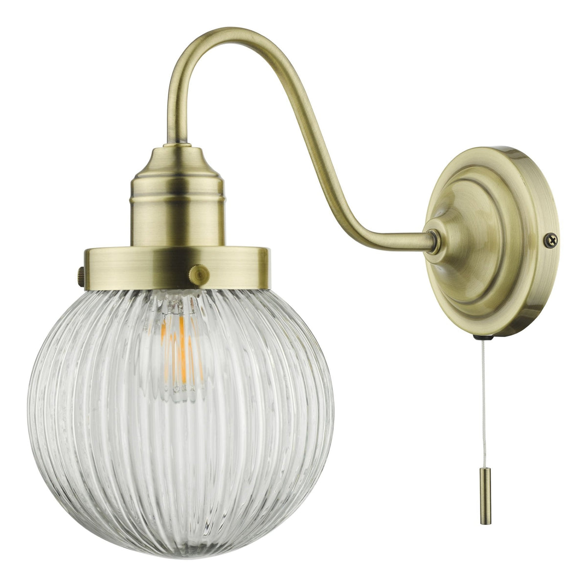 Antique brass wall light with a ribbed glass globe shade and pull cord switch.
