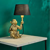 Zira Monkey Table Lamp In Gold With Black Faux Silk Shade