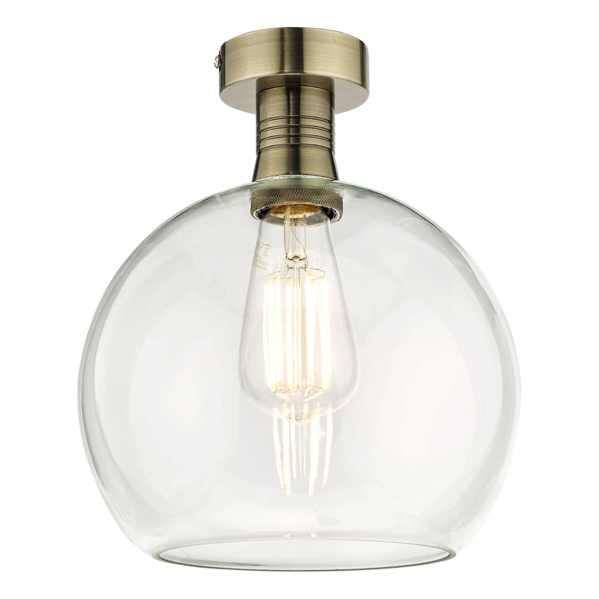 A clear glass dome ceiling light with a brass base and an exposed filament bulb.