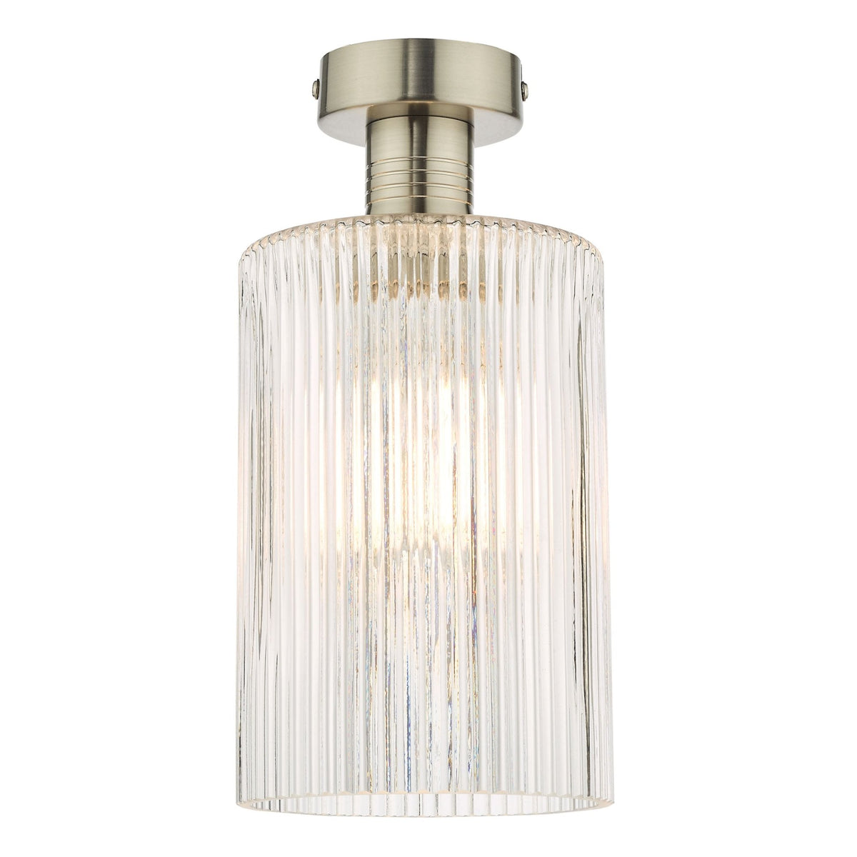 Brushed nickel ceiling light with a ribbed clear glass shade, illuminating a warm glow.