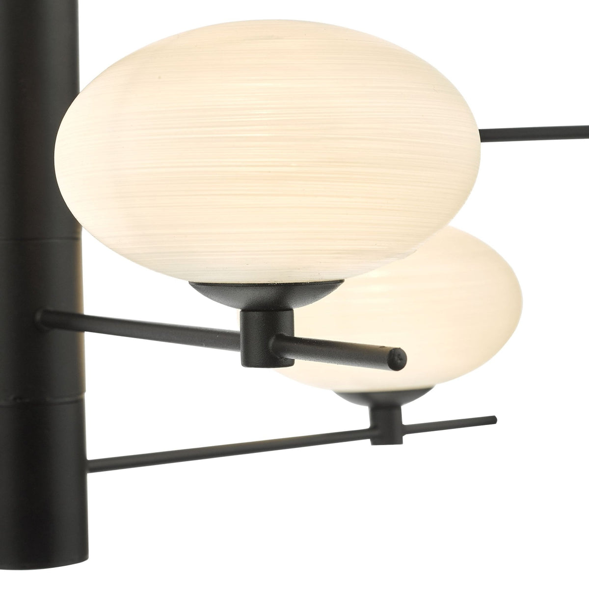Close-up of a modern black chandelier with two frosted white globe lights.