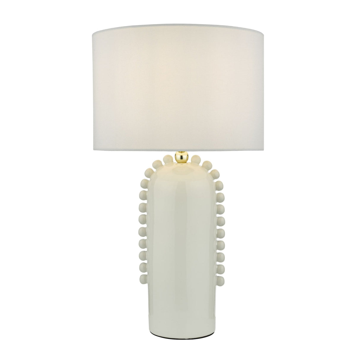 Cream ceramic table lamp with a white drum shade and decorative bobbles on the base. 