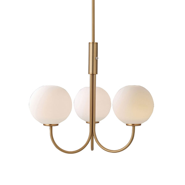 A close-up of a three-light brass chandelier with spherical opal glass shades.