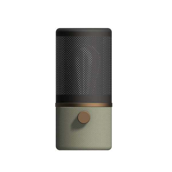 A modern, cylindrical air humidifier in sage green and black with a copper accent.