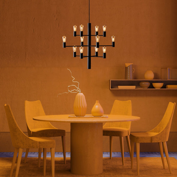 A black chandelier illuminating a stylish dining room with a round table and four chairs.