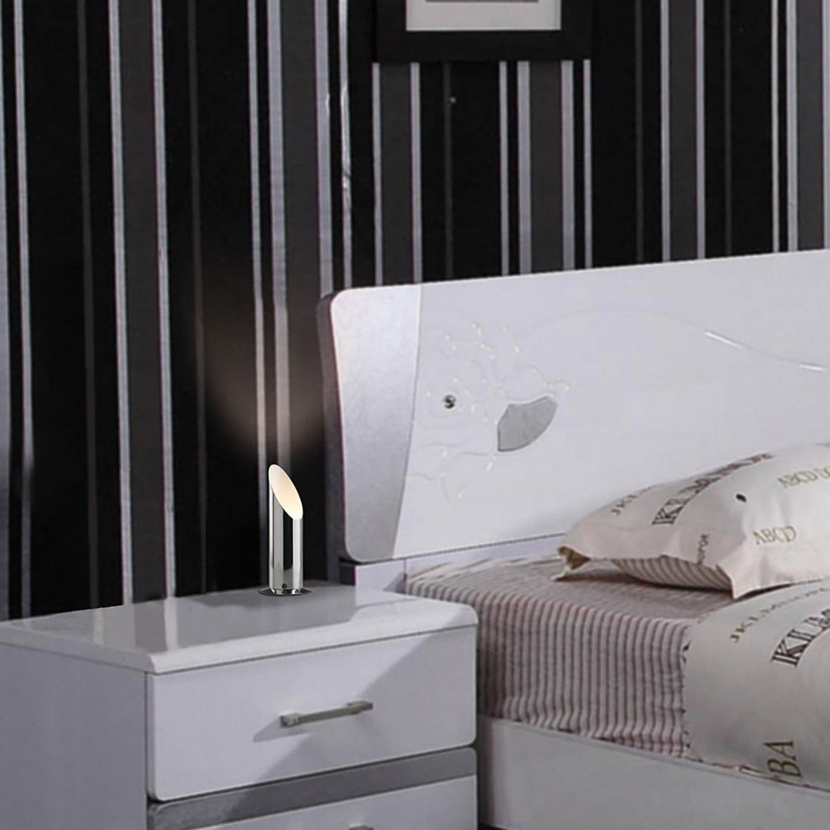 Indio Uplighter Table Lamp in a Polished Chrome Finish