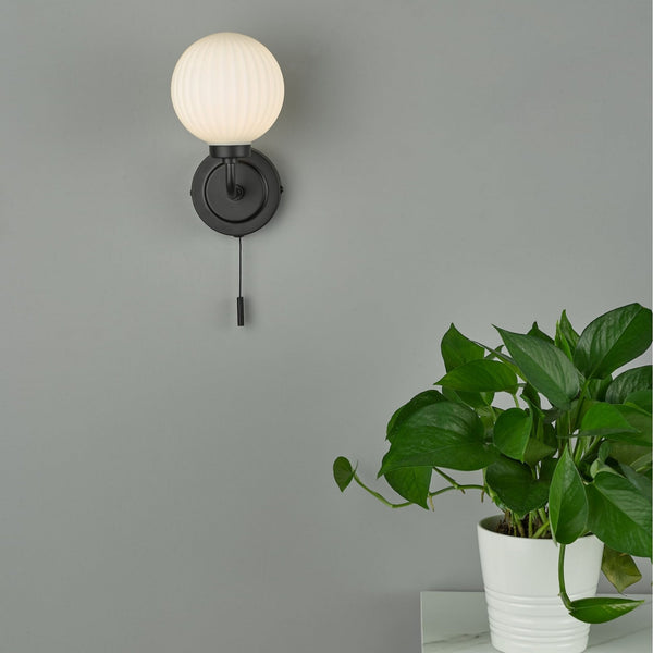 Alrik IP44 Switched Wall Light In Matt Black With Ribbed Opal Shade