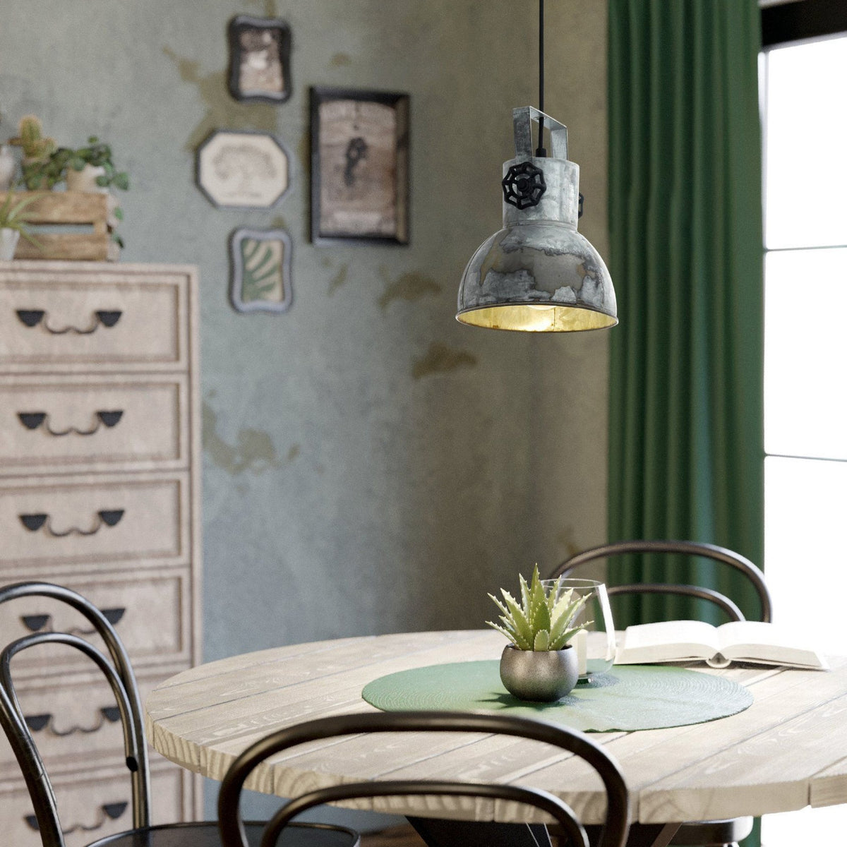 An industrial-style pendant light illuminates a dining table in a rustic room setting.