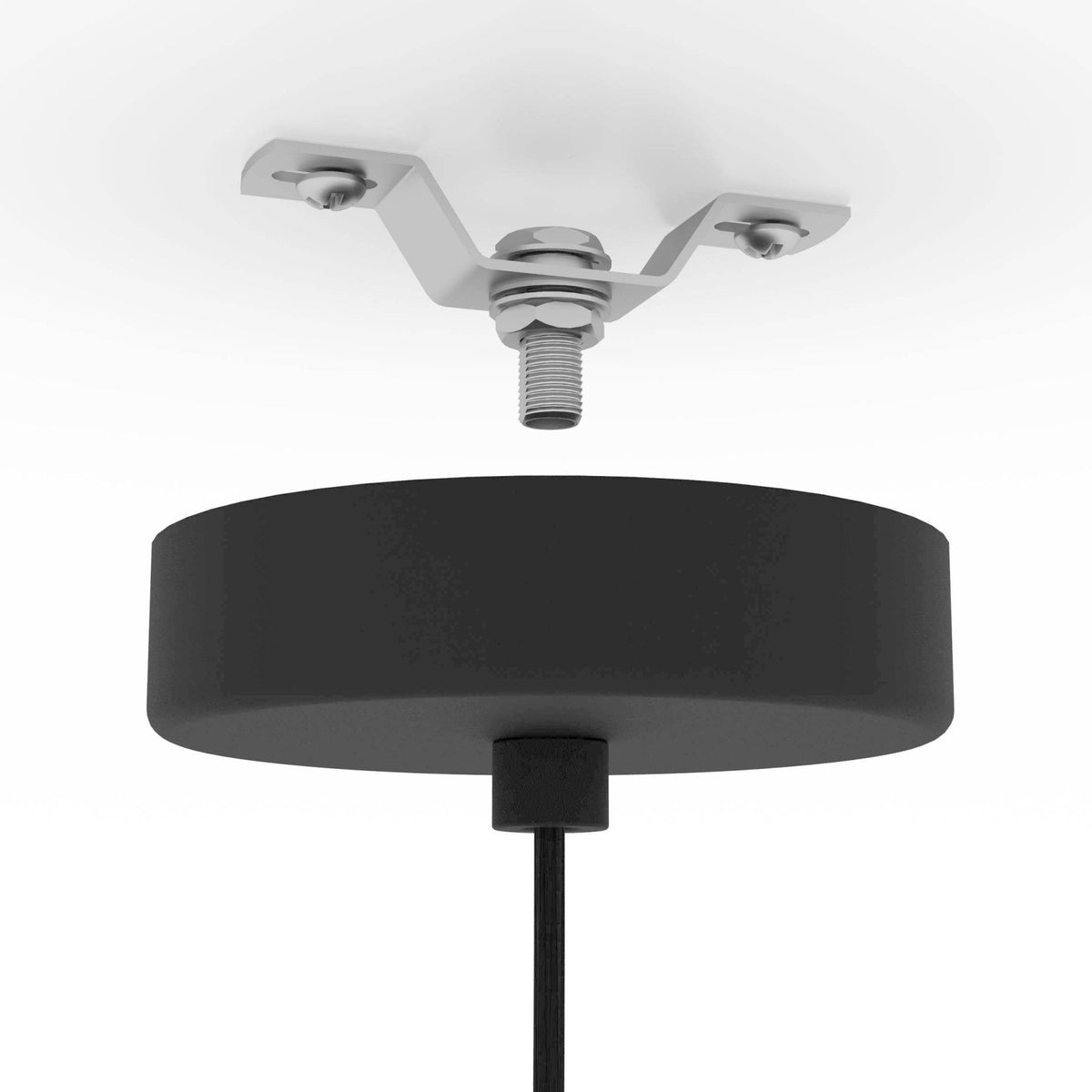 Close-up of the black ceiling rose and metal bracket for the pendant light installation.