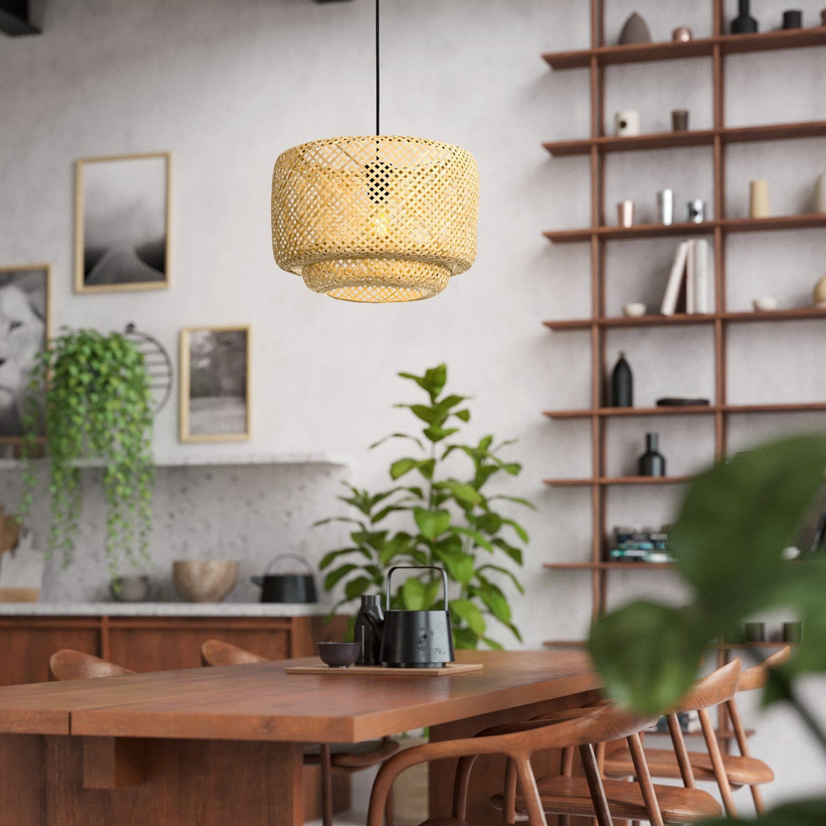 A bamboo pendant light hangs over a wooden dining table in a contemporary living space.