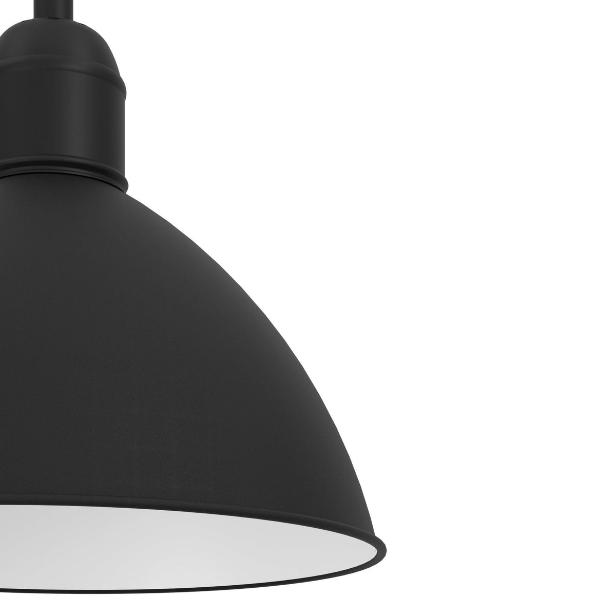A close-up view of the black dome-shaped shade of a pendant light with a white interior.