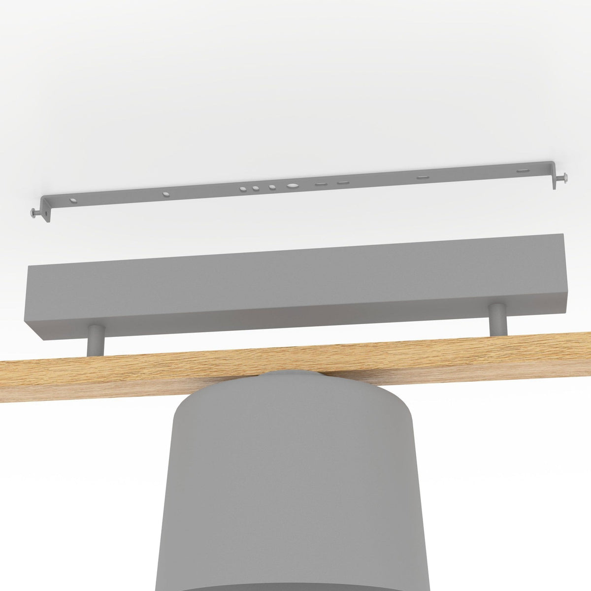 The assembly of a ceiling light showing the grey mounting plate and wooden beam.