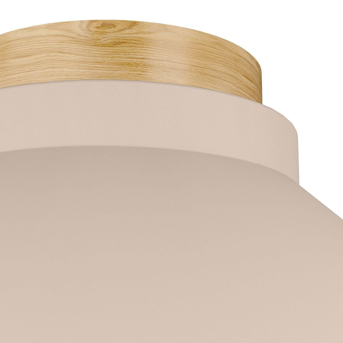 Close-up of the beige shade and light wood accent on a flush mount light.