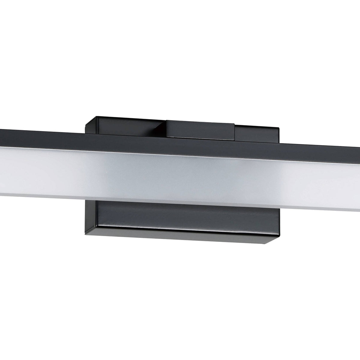 A close-up of the centre of a black rectangular LED mirror light with a white diffuser, off.