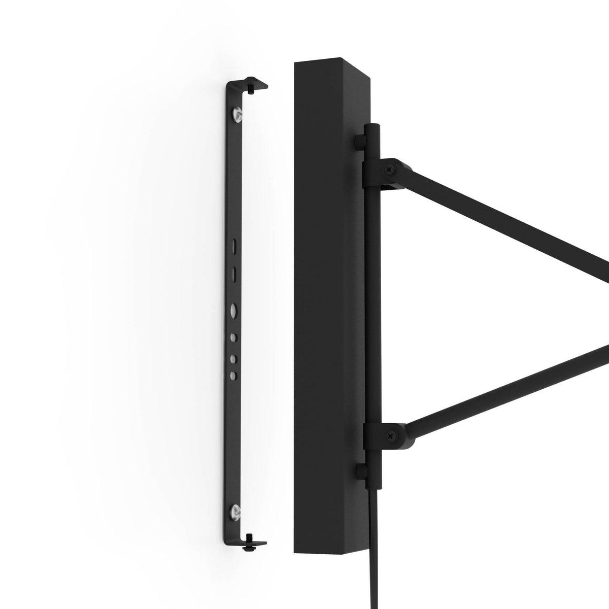 View of the black wall mount and separate bracket for installation.