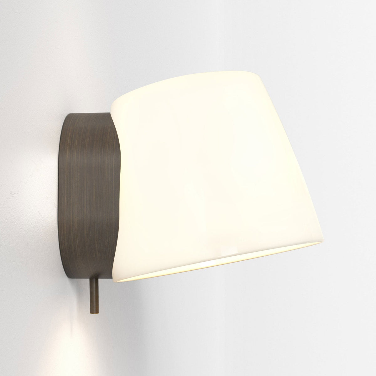 Wall-mounted light fixture with a dark bronze base and a white conical shade