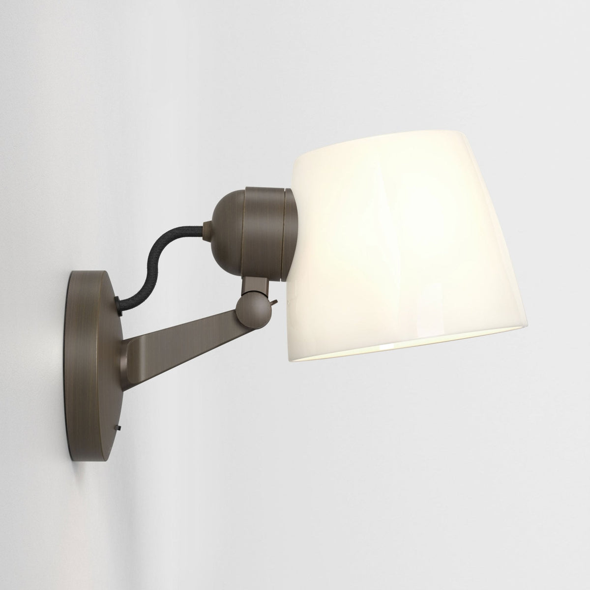 Bronze wall light with a white conical shade