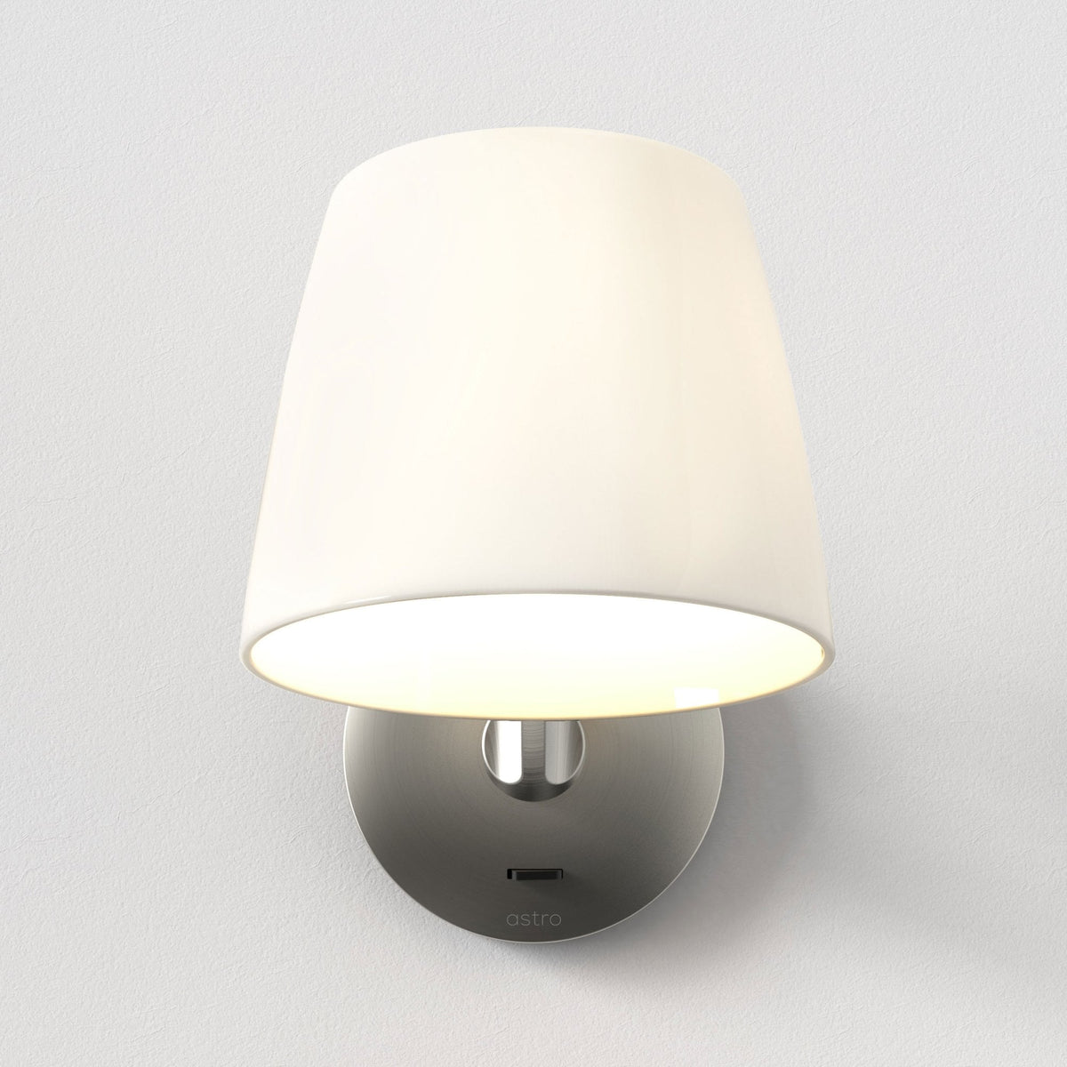 White fabric shade wall light with a brushed nickel base and a USB charging port