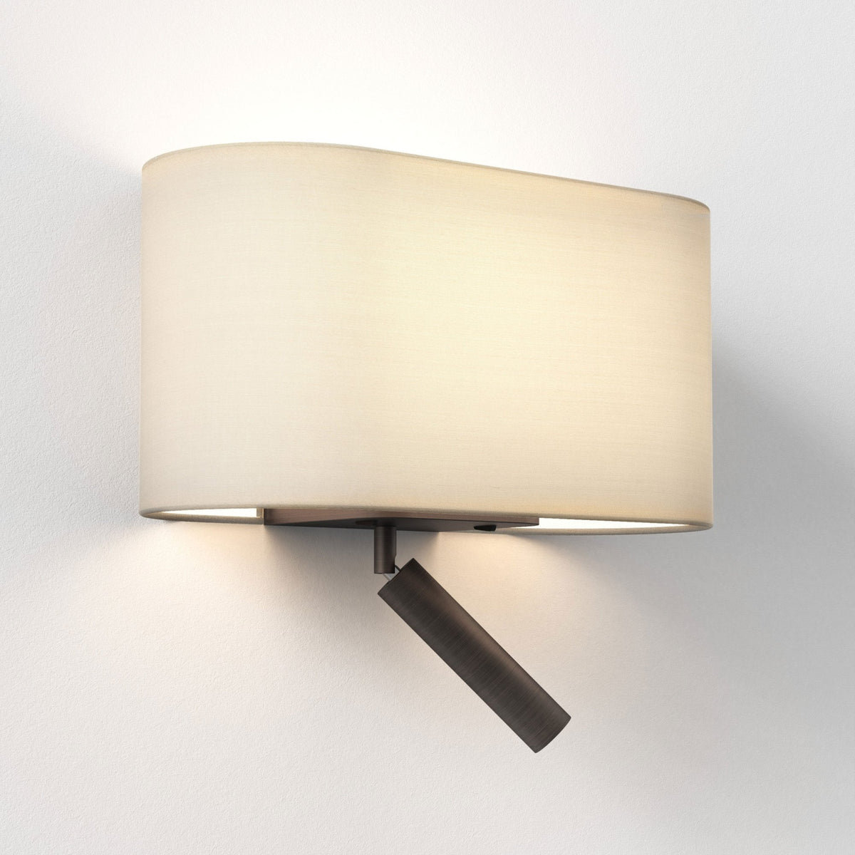Wall-mounted light fixture with an oval fabric shade and an adjustable reading light below