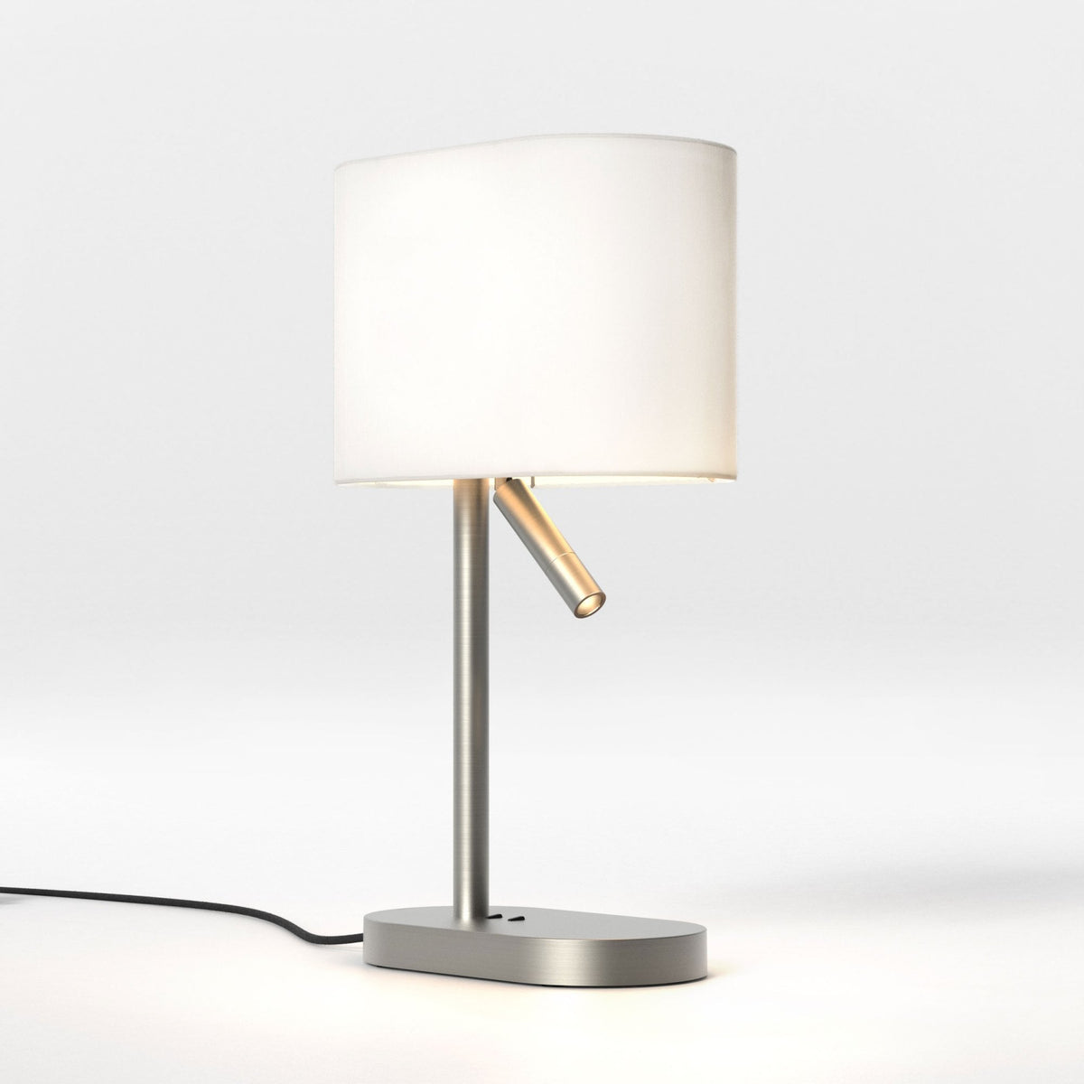 Brushed metal table lamp with a white fabric shade and an adjustable reading light