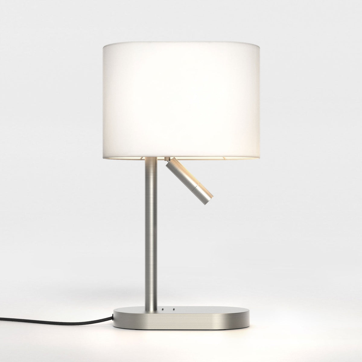 Brushed metal table lamp with a white fabric shade and an adjustable reading light