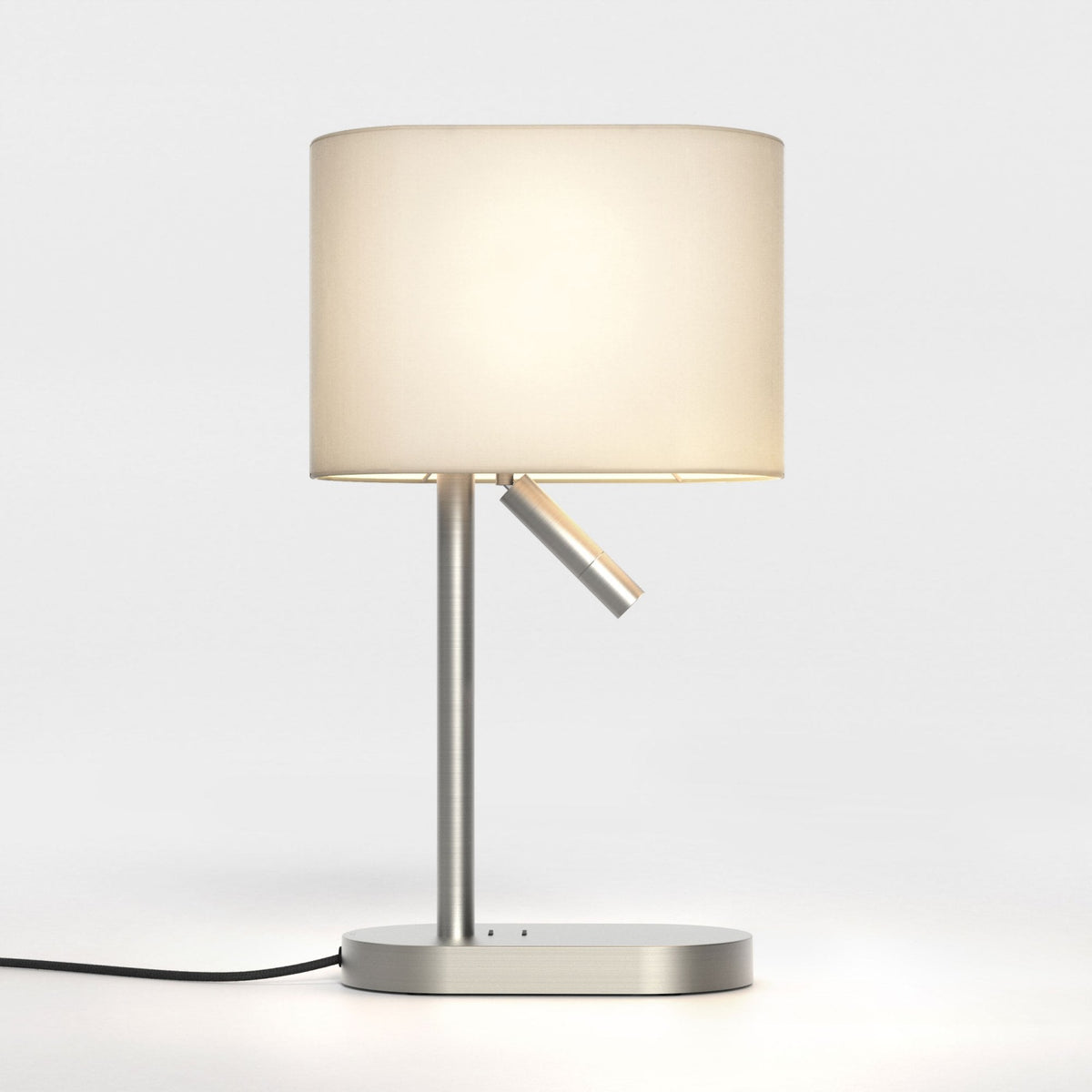 Brushed metal table lamp with a cream fabric shade and an adjustable reading light