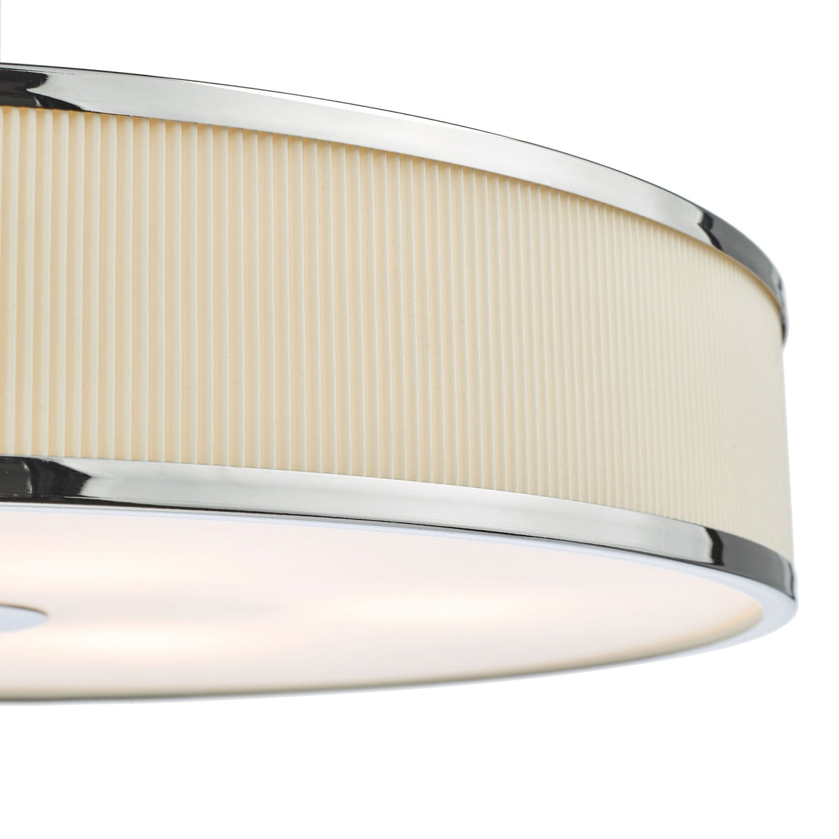 Close-up of a modern ceiling light with a pleated cream fabric shade and chrome trim.