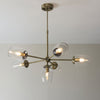 Maeve Six Light Adjustable Stem Pendant in Antique Brass & Clear Glass