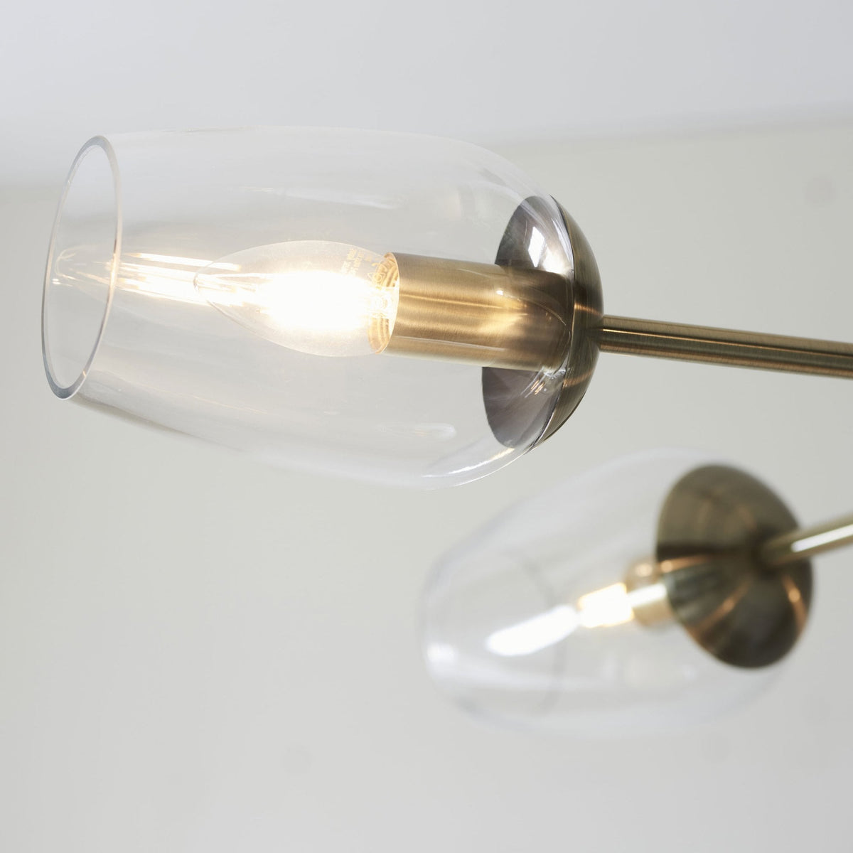 Maeve Six Light Adjustable Stem Pendant in Antique Brass & Clear Glass