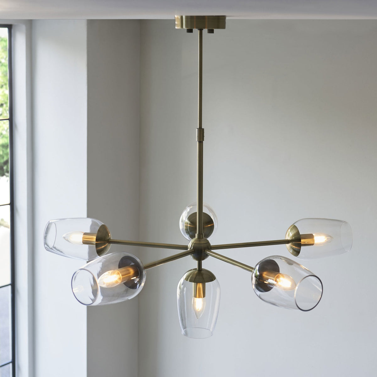 Maeve Six Light Adjustable Stem Pendant in Antique Brass & Clear Glass