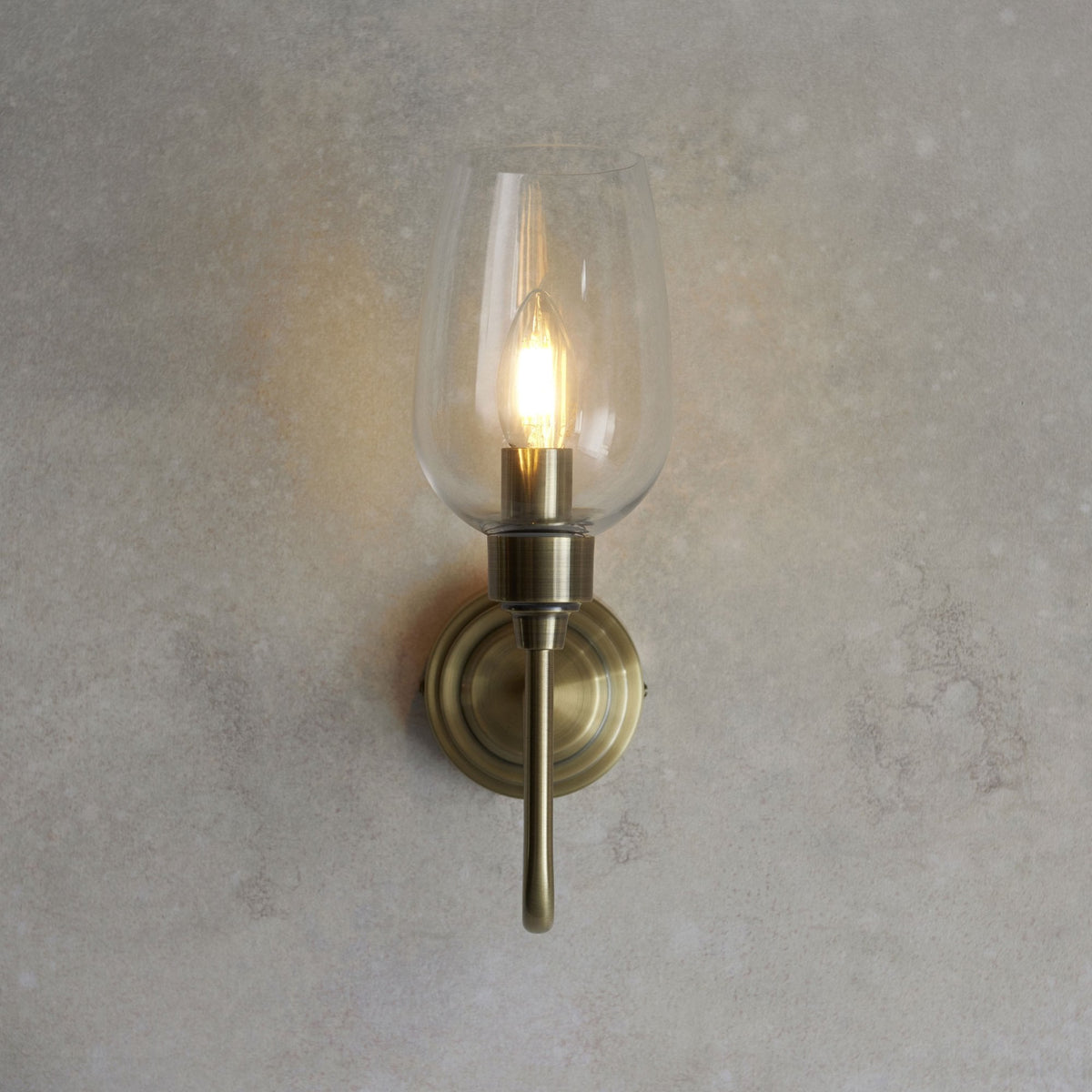 Martell Single Wall Light in Antique Brass & Clear Glass