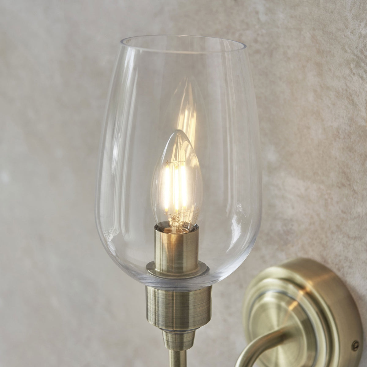 Martell Single Wall Light in Antique Brass & Clear Glass