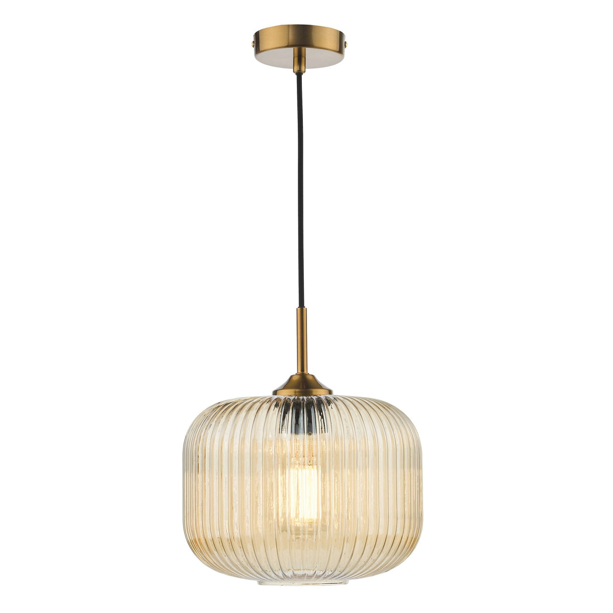 Ribbed amber glass pendant light with a brass fixture and black cord.