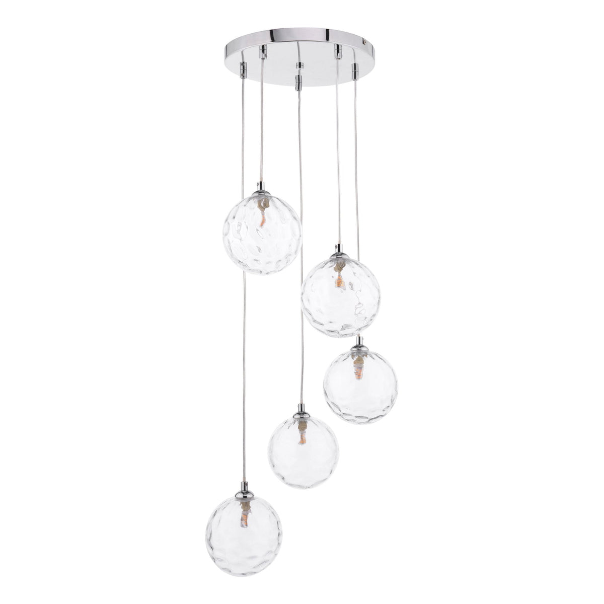 Five clear, textured glass globe pendant lights hang from a chrome ceiling plate.