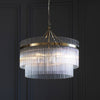 Marietta Five Light Pendant Chandelier in Antique Brass with Clear Glass Rods