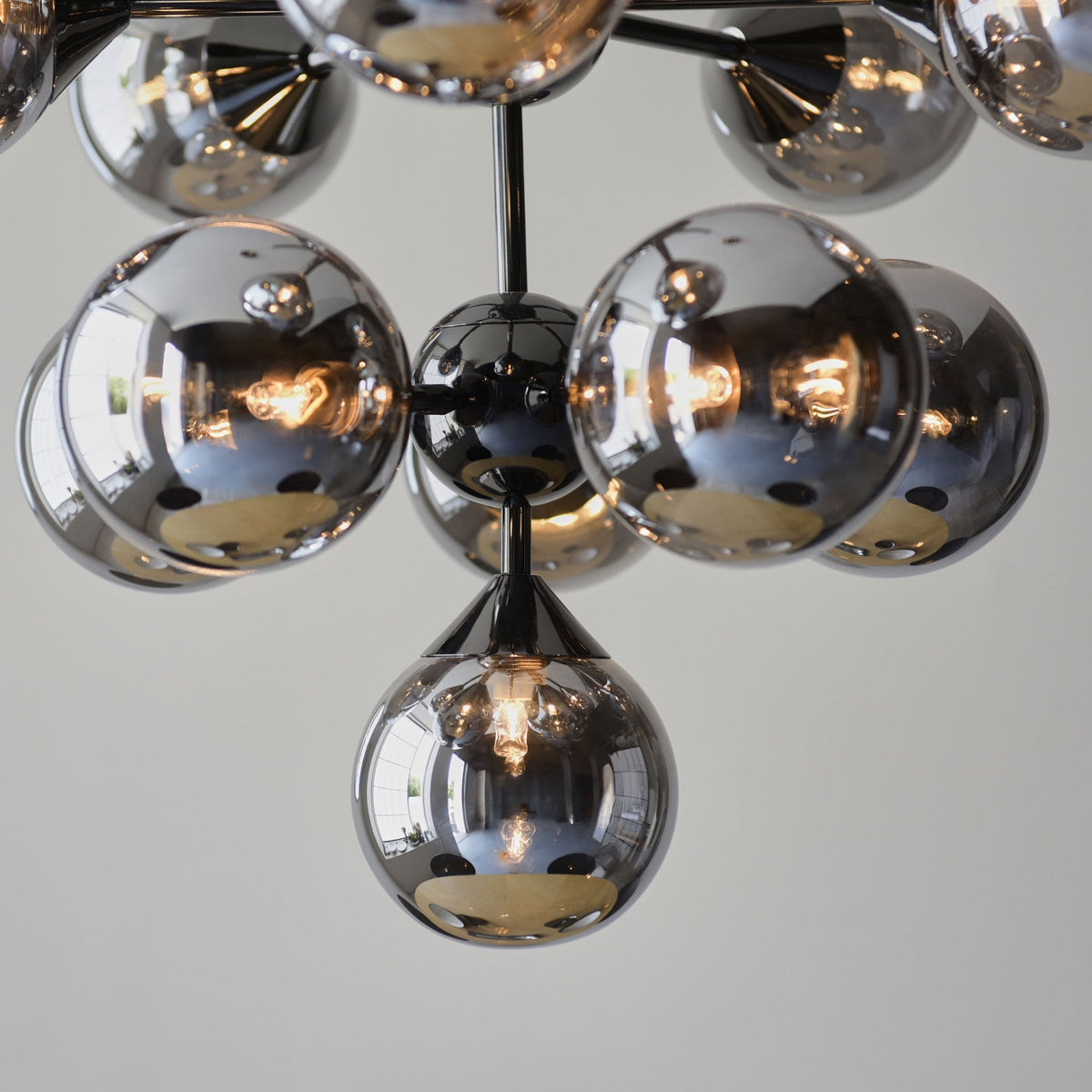 Oscar Eleven Light Pendant in Black with Smoked Mirror Glass Shades