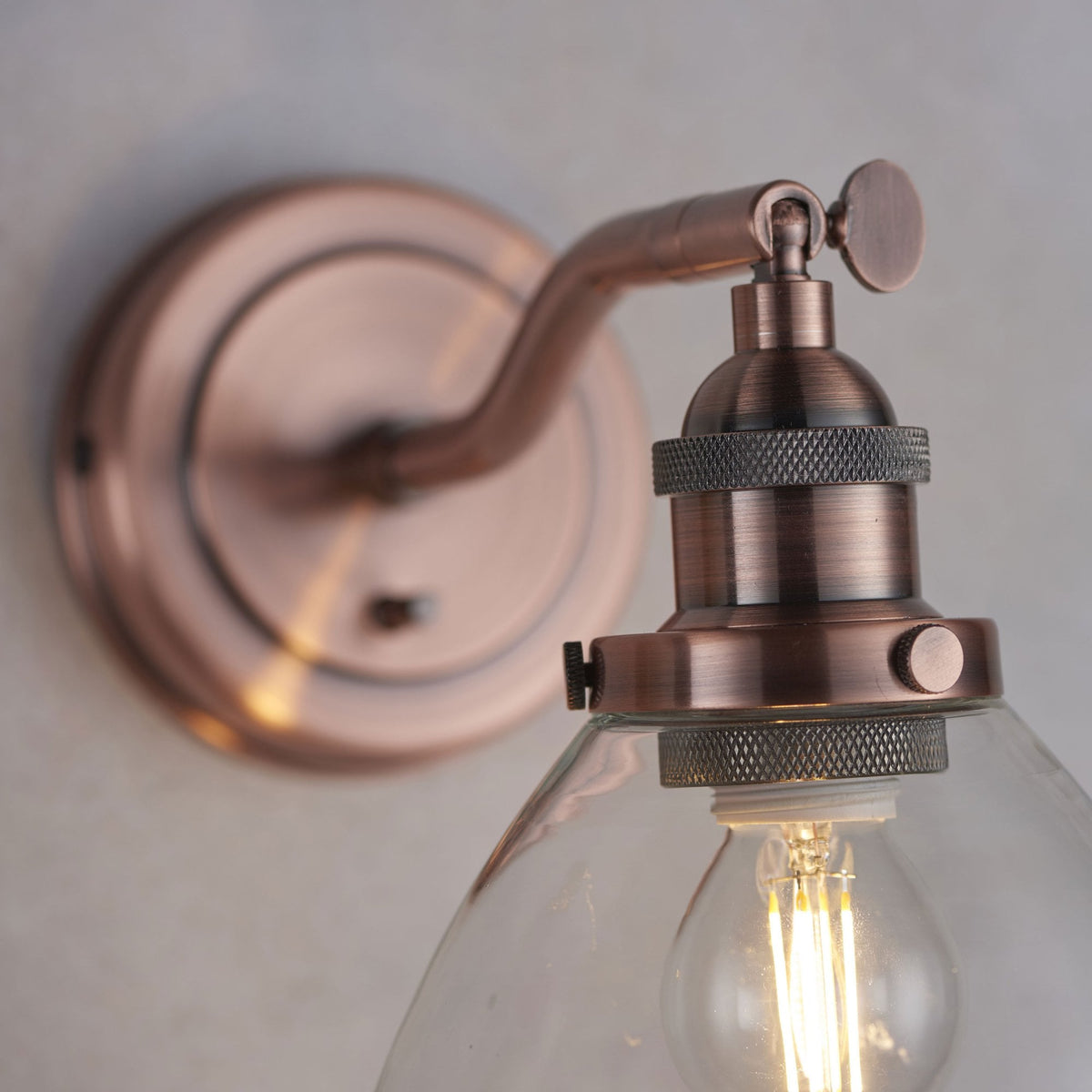 Hansen Wall Light in Copper with Clear Glass Shade