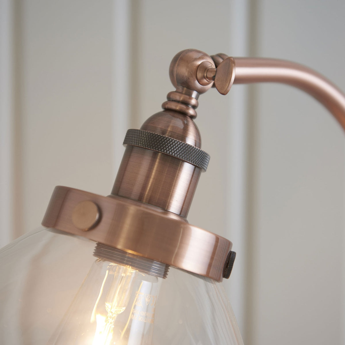 Hansen Task Floor Lamp in Aged Copper and Clear Glass Shade