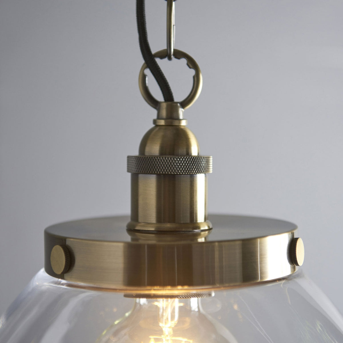 Hansen Grand Single Pendant in Antique Brass with Clear Glass Shade