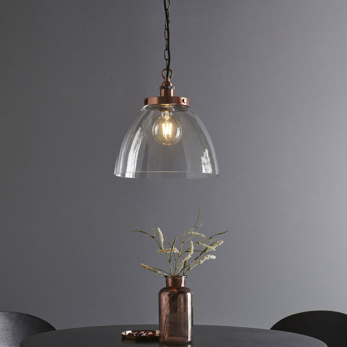 Hansen Grand Single Pendant in Aged Copper with Clear Glass Shade