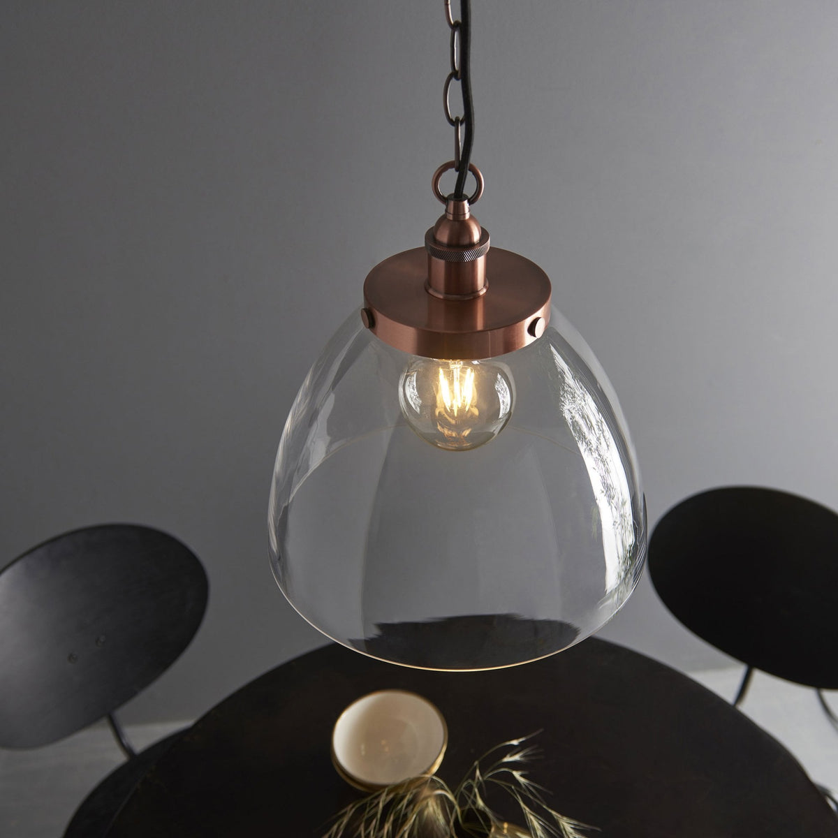 Hansen Grand Single Pendant in Aged Copper with Clear Glass Shade